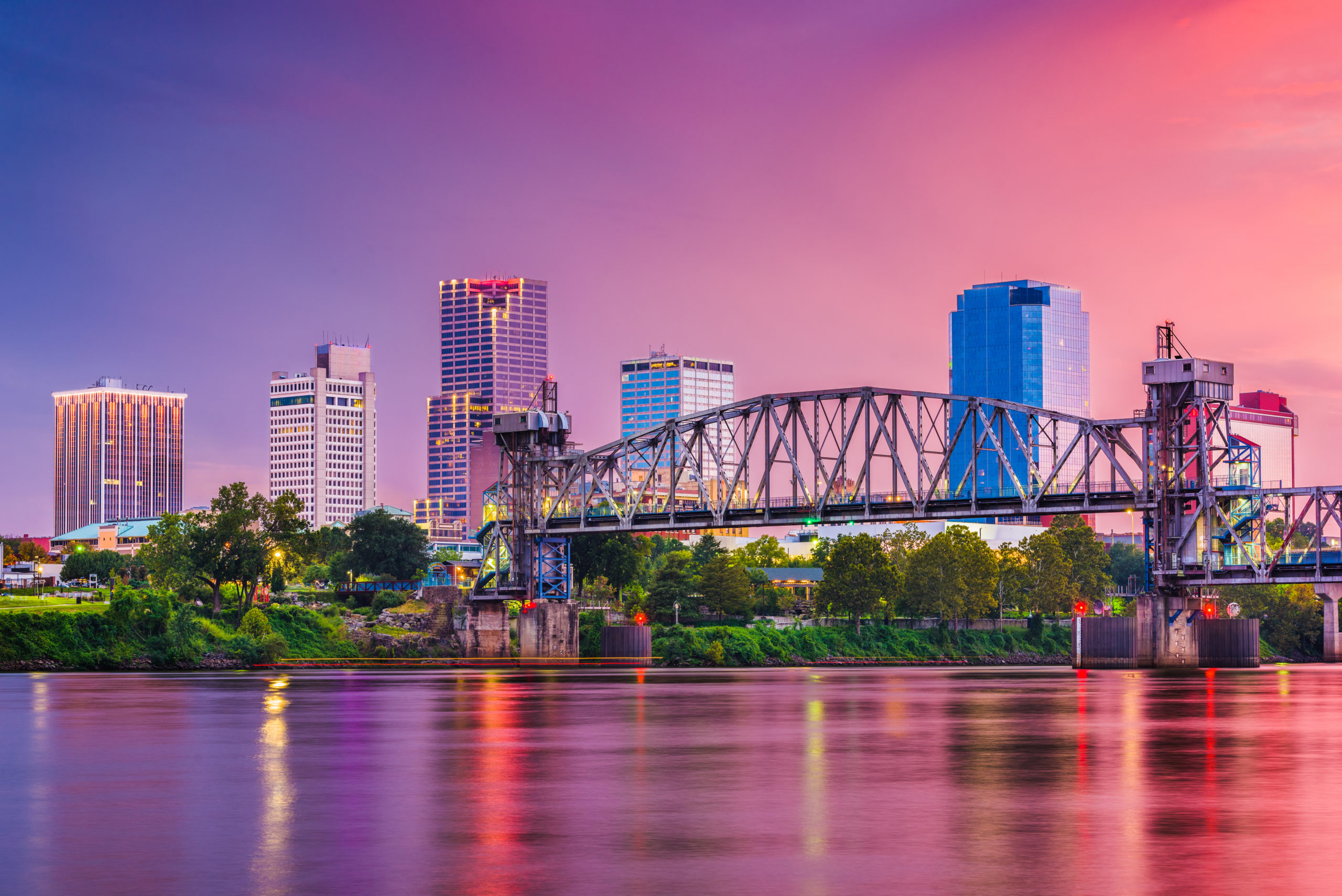 Little Rock, Arkansas, skyline on the river at twilight.