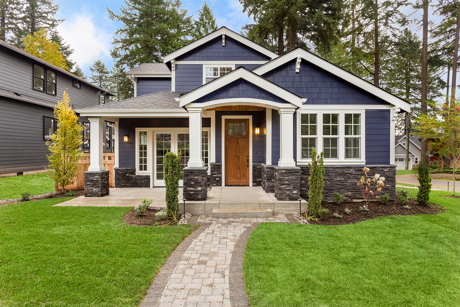 A beautiful exterior of a new luxury home, signifies the issues with home insurance costs.